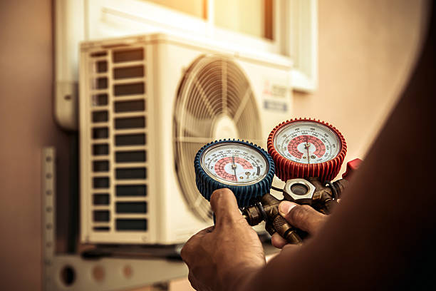 Professional Heat Pump Repair technician working in Sallis, MS